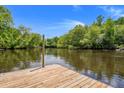 Private dock featuring a serene waterfront view at 5653 Wire Rd, Branchville, SC 29432