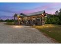 Charming home with a covered porch, perfect for enjoying the outdoors at 5653 Wire Rd, Branchville, SC 29432
