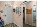 Welcoming foyer with decorated front door at 102 Amberside Dr, Goose Creek, SC 29445