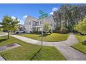 Charming two-story home with manicured lawn on a corner lot in a desirable neighborhood at 1166 Turkey Trot Dr, Johns Island, SC 29455