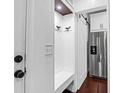 Handy mud room boasts modern fixtures and opens with a sliding barn door at 1300 Park West Blvd # 215, Mount Pleasant, SC 29466