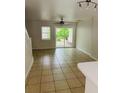 Spacious living room with natural light, tile floors, and sliding glass doors at 145 Taylor Cir, Goose Creek, SC 29445