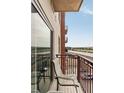Enjoy the view of the highway from the balcony, perfect for relaxation or dining al fresco, reflecting in the window at 150 Bee St # 507, Charleston, SC 29401