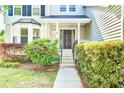 Inviting home entrance with lush landscaping and a charming front porch at 1541 Diamond Blvd, Mount Pleasant, SC 29466