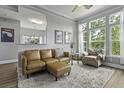 Bright living room featuring a ceiling fan, multiple windows, and an open concept at 1735 Telfair Way, Charleston, SC 29412