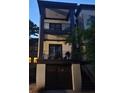Charming three-story home with multiple balconies and garage access, perfect for city living at 22A Corinne St # 31, Charleston, SC 29403