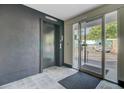 Hallway with elevator access and doorway to parking area at 259 E Bay St # 7C, Charleston, SC 29401