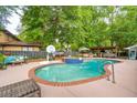 Backyard with inviting pool, basketball hoop, and outdoor seating perfect for entertaining guests at 5 S Basilica Ave, Hanahan, SC 29410
