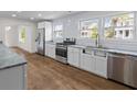 Modern kitchen featuring stainless steel appliances and hardwood floors at 5163 W Dolphin St, North Charleston, SC 29405
