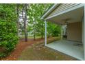 Covered back porch for outdoor enjoyment at 8624 Grassy Oak Trl, North Charleston, SC 29420
