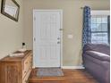 Entryway with hardwood floors, a wooden dresser, and a cozy rug at 1019 Tj Ln, Summerville, SC 29486