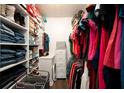 Walk-in closet with built-in shelving, drawers, and hanging space for optimal storage and organization at 103 Winston Way, Goose Creek, SC 29445