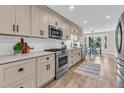 Spacious kitchen with stainless steel appliances, white countertops, and updated cabinets at 1541 Hutton Pl, Charleston, SC 29407