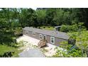 Side exterior view of manufactured home with newly built porch at 226 Collier Ln, Moncks Corner, SC 29461