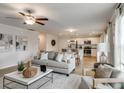 Open-concept living space with a comfortable sofa and seamless flow into the kitchen at 333 O'Leary Circle, Summerville, SC 29483