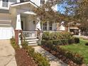 Inviting front porch with brick accents, manicured landscaping, and a charming walkway to the entrance at 3608 Maidstone Dr, Mount Pleasant, SC 29466