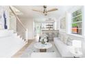 Bright living room with modern décor, light hardwood floors, and an open floor plan at 83 Avondale Ave, Charleston, SC 29407