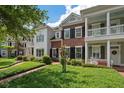 Beautiful homes featuring double porches, manicured lawns, and a welcoming neighborhood ambiance at 1781 Tennyson # 6, Mount Pleasant, SC 29466