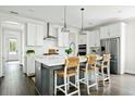 Modern kitchen with a large island, stainless steel appliances, and sleek finishes, perfect for culinary enthusiasts at 1872 Rifle Range Rd, Mount Pleasant, SC 29464