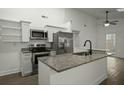 Modern kitchen with stainless steel appliances, granite countertops and white cabinetry at 335 Macgregor Dr, Summerville, SC 29486