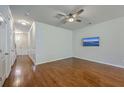 Spacious living room with hardwood floors, a ceiling fan, and a television at 3367 Eastman Dr, Mount Pleasant, SC 29466