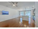 Open concept living space featuring hardwood floors, a modern kitchen, and plenty of natural light at 3367 Eastman Dr, Mount Pleasant, SC 29466