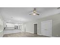 Living room with wood ceiling fan flowing into the kitchen area and storage at 4013 A Ladson Rd, Ladson, SC 29456