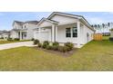 Beautiful home featuring a two-car garage, manicured lawn and tasteful landscaping at 292 Shadybrook Dr, Summerville, SC 29486