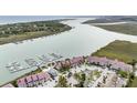 Waterfront condo community with boat docks, parking, and views of the marsh and waterways at 74 Mariners Cay Dr, Folly Beach, SC 29439