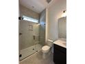 Modern bathroom featuring a glass-enclosed shower with tile surround and updated fixtures at 139 Summerwind Dr, Summerville, SC 29486