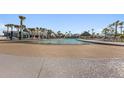 Zero entry community pool featuring comfortable lounge seating at 141 Trillium Cir, Summerville, SC 29486