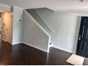 Open living space with stairs and fresh neutral paint at 1735 Boone Hall Dr # K6, Charleston, SC 29407