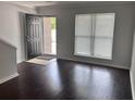 Beautiful hardwood floors and natural light in the main living area at 1735 Boone Hall Dr # K6, Charleston, SC 29407