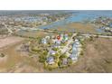 An aerial view shows the property's location nestled within a quiet coastal neighborhood at 2107 Club View Ct, Charleston, SC 29412