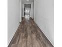 Hallway with beautiful flooring and view to other rooms at 424 Carrara Dr, Summerville, SC 29486