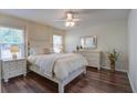 Bright main bedroom with hardwood floors, a ceiling fan, and ample natural light at 1006 Ibis Ct, Mount Pleasant, SC 29464