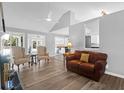 Open concept living room with luxury vinyl plank flooring and a view of the kitchen at 1918 Armory Dr, Mount Pleasant, SC 29466