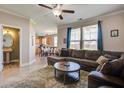 Open living room and dining area with modern furniture and updated features, ideal for entertaining guests at 2113 Pimlico Dr, Ridgeville, SC 29472
