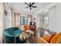 Bright living room with hardwood floors, modern furniture, and natural light at 272 Coming St # C, Charleston, SC 29403