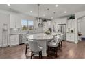 Gourmet kitchen featuring a large island with seating, stainless steel appliances, and ample cabinet space at 403 Hidden Meadow Ln, Summerville, SC 29486