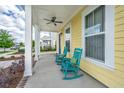 Inviting front porch featuring classic rocking chairs and charming details at 403 Ripple Park Dr, Summerville, SC 29486