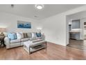 Cozy living room featuring hardwood floors, modern furniture, and an inviting atmosphere for relaxation at 108 Williamsburg Ct, Goose Creek, SC 29445