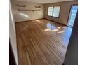 Bright living room with hardwood floors and natural light at 1138 Landsdowne Dr, Charleston, SC 29412