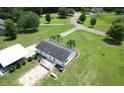 Beautiful single-Gathering home from above, highlighting a large yard, patio deck, and picturesque surrounding neighborhood at 131 Travis Hill Rd, Moncks Corner, SC 29461