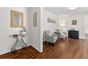Elegant living room with gleaming hardwood floors, neutral paint, and stylish furniture at 1317 White Dr, Charleston, SC 29407
