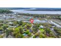 Aerial view of the property showcasing its waterfront location near the bay at 1673 Mcclain St, Charleston, SC 29407