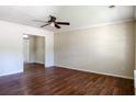 Bright living room featuring hardwood floors, a ceiling fan, and fresh paint at 206 Trickle Dr, Summerville, SC 29483
