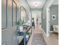 Welcoming entryway featuring stylish decor, a console table, and a decorative mirror at 2809 Conservancy Ln, Charleston, SC 29414