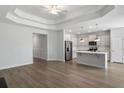 Bright, open-concept kitchen with stainless steel appliances and a center island at 603 Yellow Leaf Ln, Summerville, SC 29486
