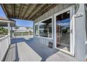 Spacious outdoor deck area, great for enjoying the ocean breeze and neighborhood views at 625 Ocean Blvd, Isle of Palms, SC 29451